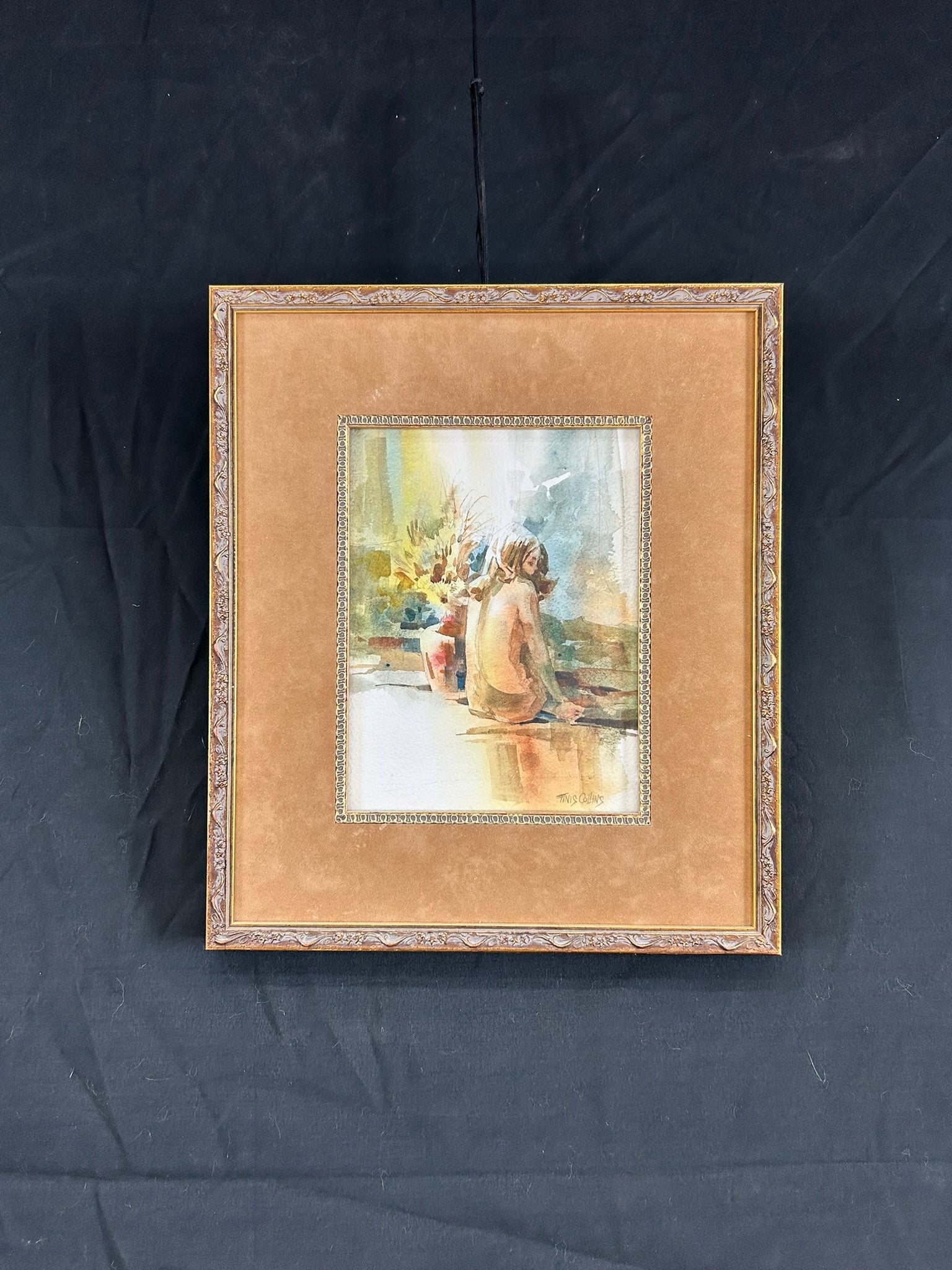 Watercolor painting of a nude young woman seated on the beach, facing away, by Finis F. Collins.
