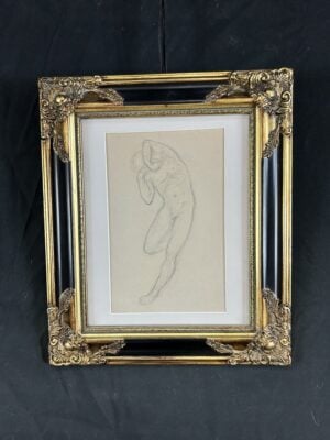 Graphite sketch of a standing male nude, attributed to American artist Khalil Gibran, framed in ornate gold and black.